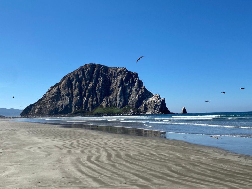 View of Morro Rock in Morro Bay California. One of the top California central coast towns to visit. 