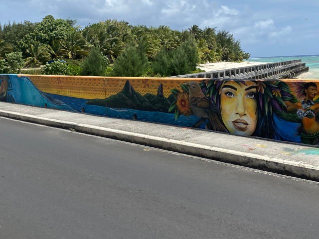 A view of the Marae Morana Mural painted of the Nikao seawall in Rarotonga.