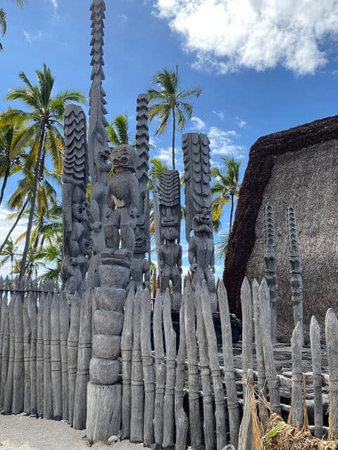 View of wood carvings at Puʻuhonua o Hōnaunau National Historical Park on the Big Island of Hawaii