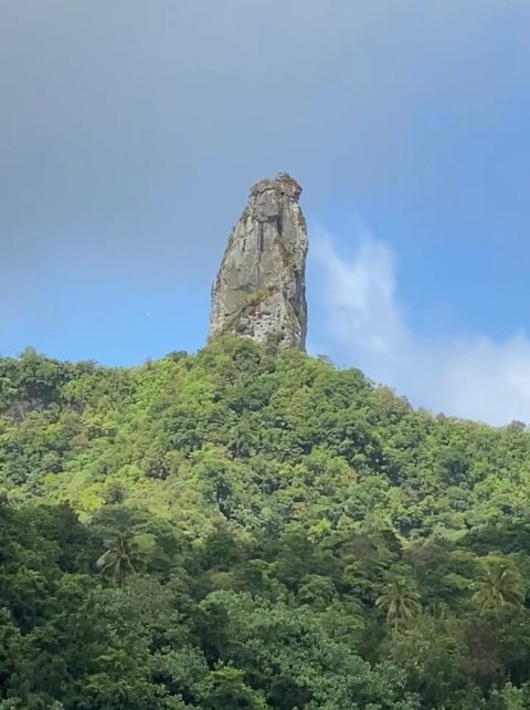View of Te Rua Manga, a tall rocky pinnacle that is also known as the Needle in Rarotonga, Cook Islands