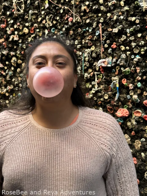 Mireya blowing a bubble with her bubblegum at Bubblegum Alley