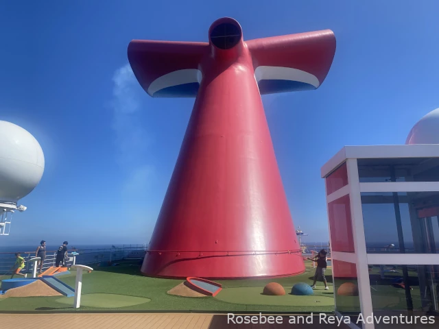 Mini-golf course around the funnel on the Carnival Radiance