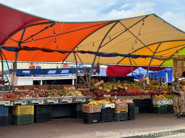 Vegetable stands at the Floating Market in Punda