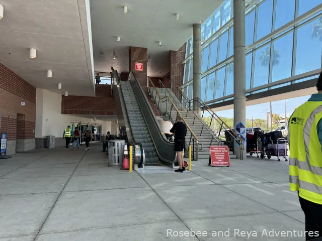 View of the escalators leading to the second floor entrance to Terminal 3 Port Tampa Bay.