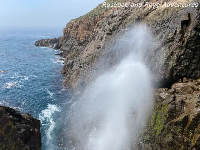 Picture of water being blown in the air at La Bufadora, the blowhole, at one of the most popular tourist places to visit in Ensenada, Mexico.