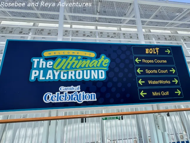 Picture of the Ultimate Playground welcome sign helping you know the way to the ropes course, mini-golf, Bolt, Waterworks, and Sports Court.