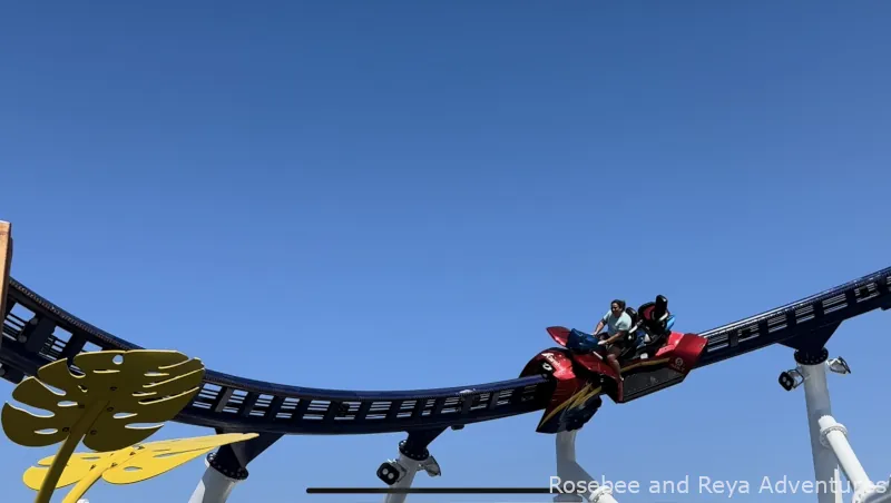 View of Reya riding on the Bolt Rollercoaster on the Carnival Celebration