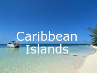 View of a boat anchored off a Caribbean Beach in the Cayman Islands