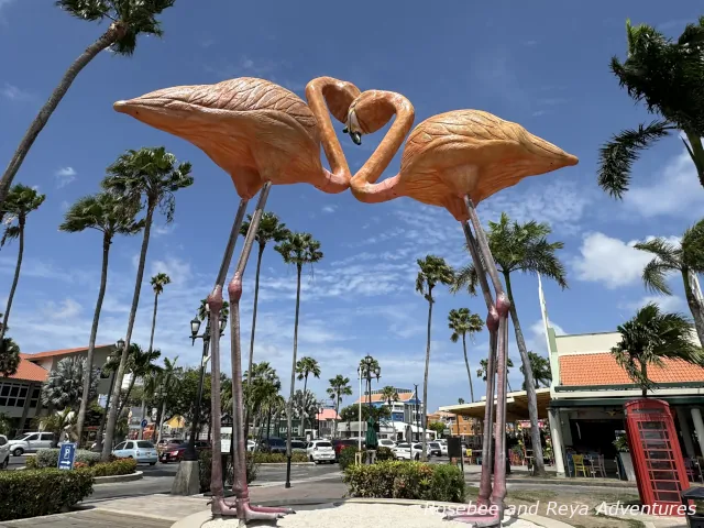 View Flamingo Statues in Oranjestad