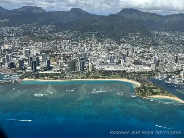 This is an aerial view picture of Ala Moana Beach Park and Magic Island on the island of Oahu, Hawaii
