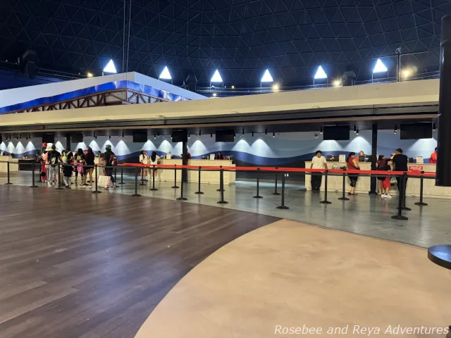 Picture of guest services inside the Carnival Cruise Terminal in Long Beach, after getting checked in to board and going through security.