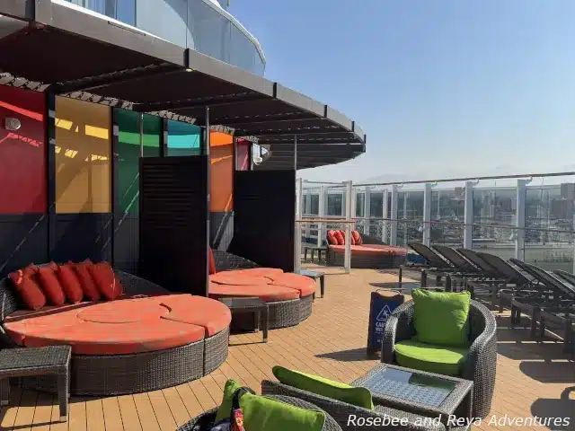 Picture of Carnival Cruise Line's Havana Experience sundeck with daybeds, outdoor seating, and loungers on the Carnival Panorama