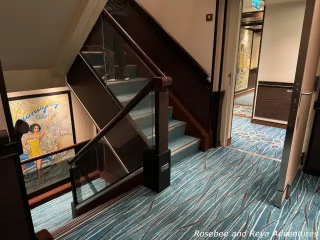 Picture of the Havana Experience stairwell on the Carnival Panorama that connects floors six through nine to the fifth floor for Havana guests